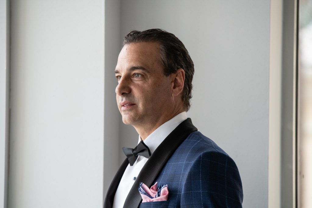 West Palm Beach wedding venue with groom wearing cocktail attire